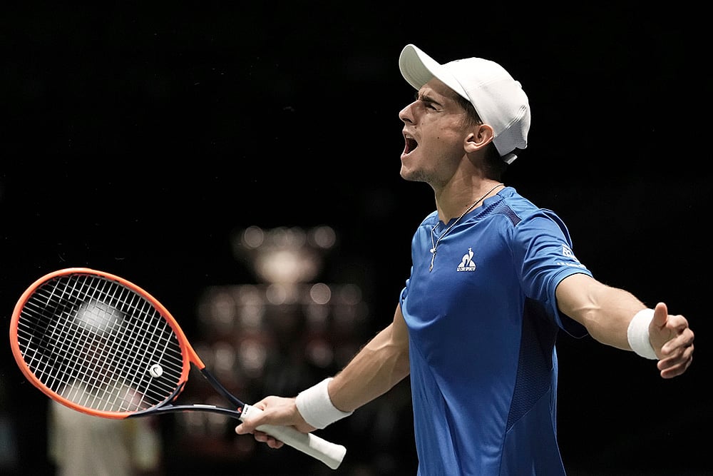 | Photo: Michele Nucci/LaPresse via AP : Davis Cup Tennis, Italy vs Brazil: Matteo Arnaldi, of Italy, celebrates winning match against Thiago Monteiro, of Brazil